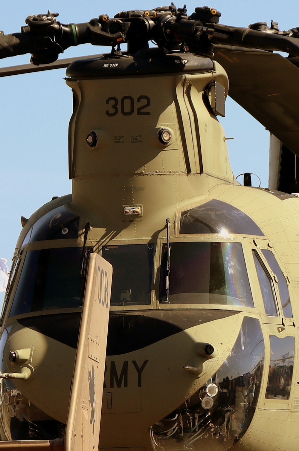 a close up of the front of a military helicopter