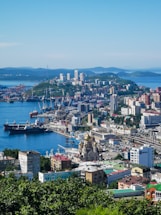 a large body of water surrounded by a city