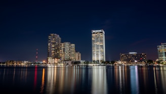 a view of a city at night from across the water