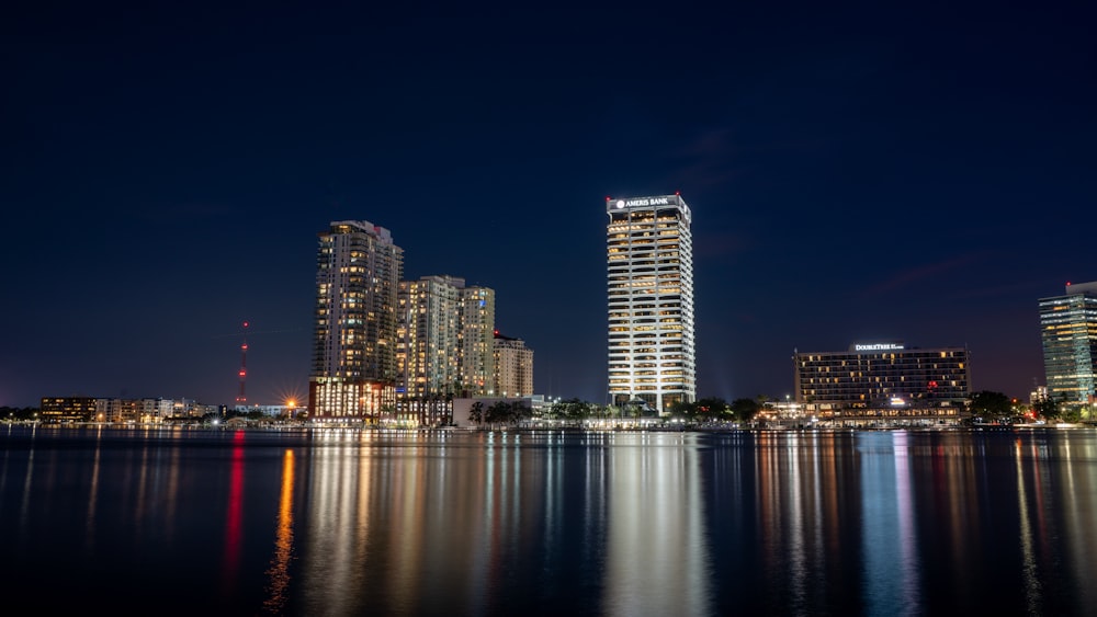 a view of a city at night from across the water