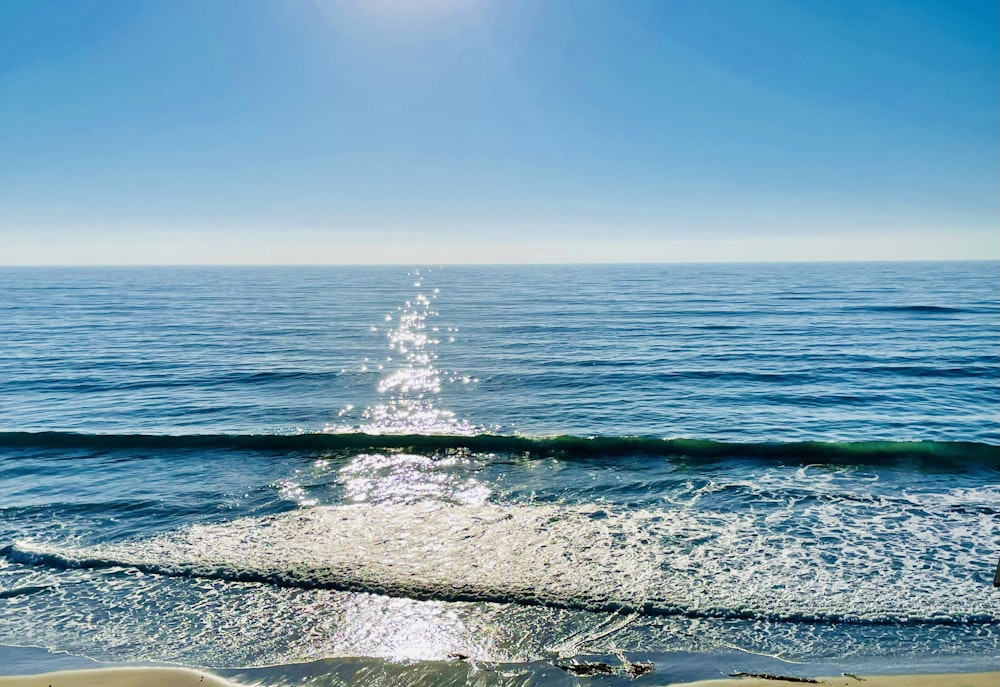 a view of the ocean from a beach