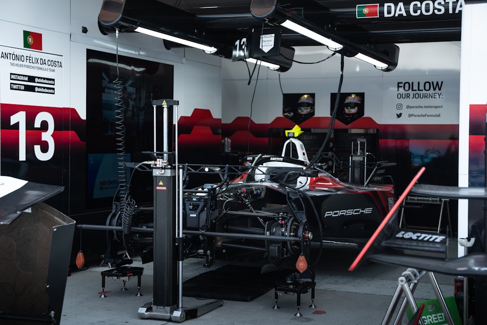 a race car is parked in a garage