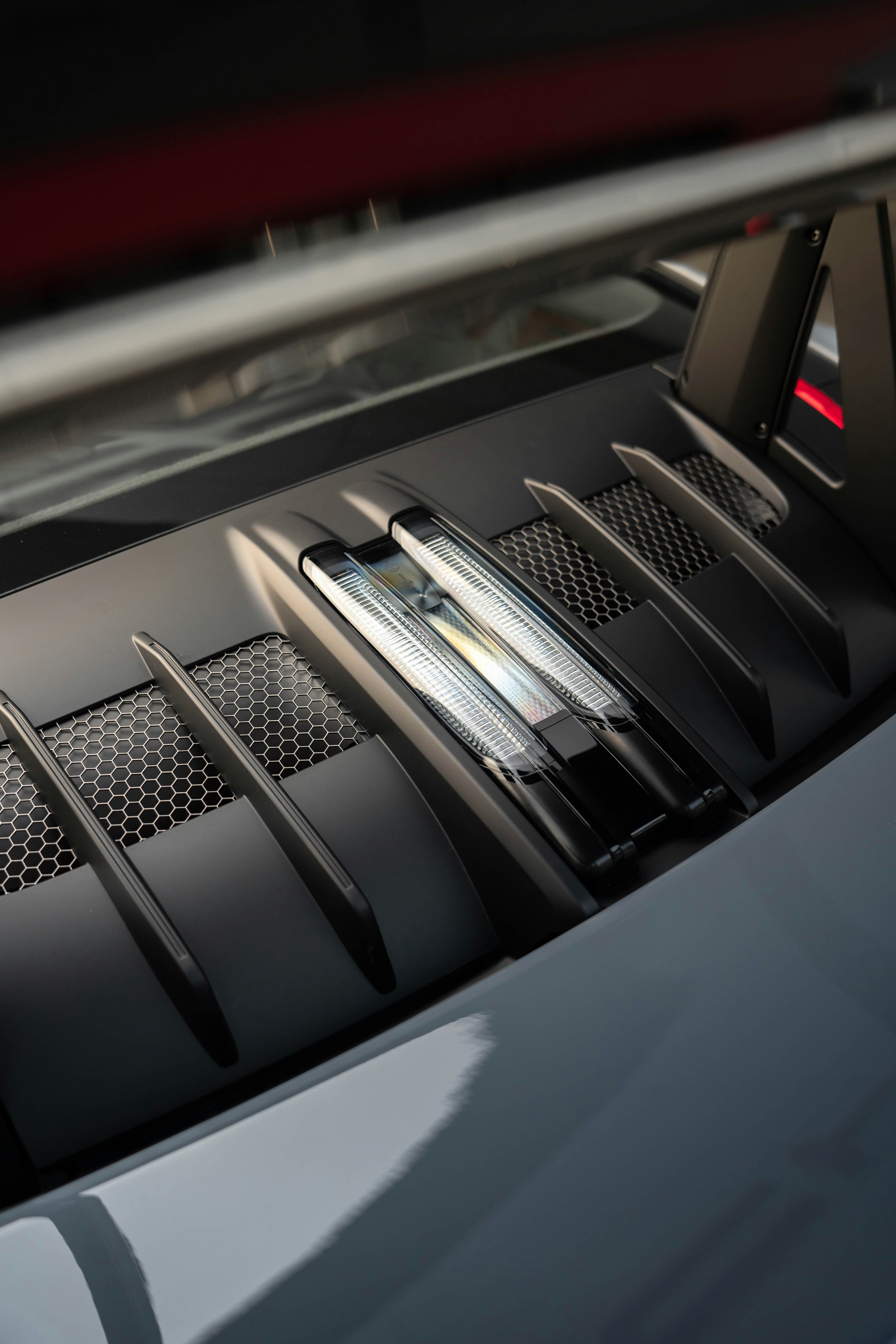Modern passenger car engine bay showcasing advanced automotive technology