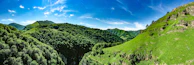 A panoramic view of Tocantins’ rolling hills under a bright blue sky.