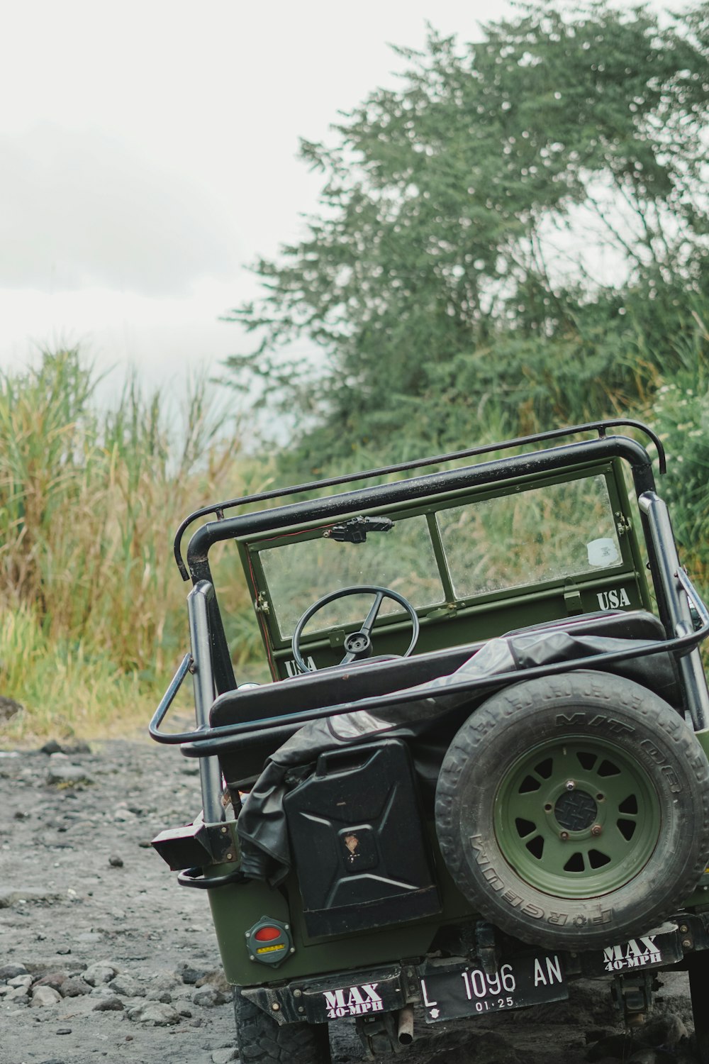 a jeep is parked on the side of the road