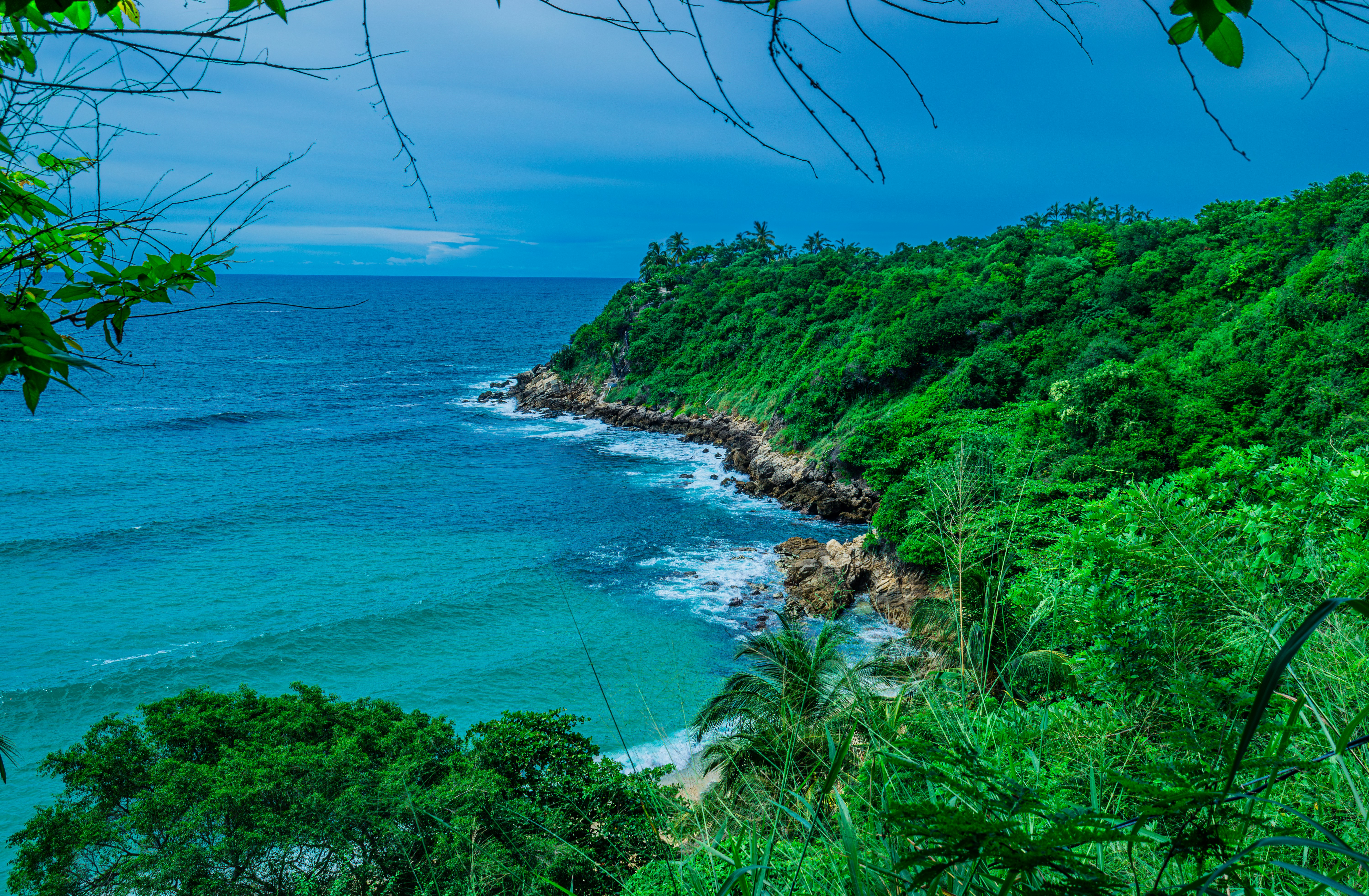 a view of the ocean from a cliff