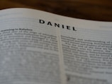 Bright thumbnail showing the story of Daniel in the lions' den.