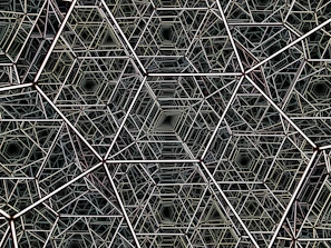 Close-up of metallic silver hexagons interlocking over a deep blue ocean background.