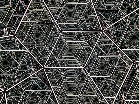 Abstract geometric pattern with hexagons in dark matte tones symbolizing technology.