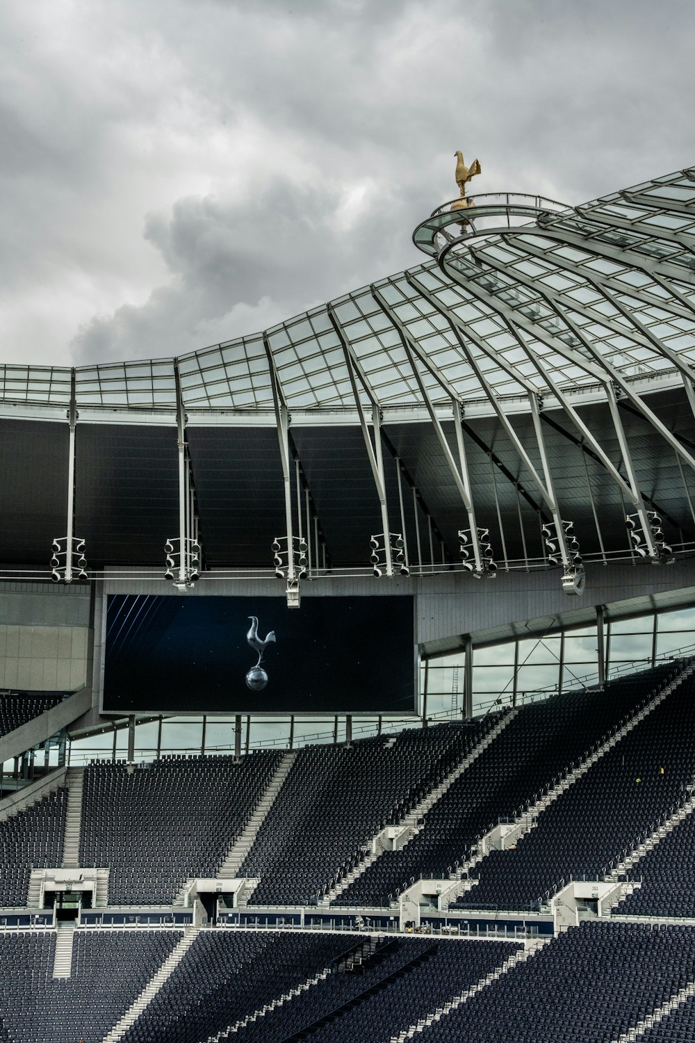 an empty stadium with a sky background