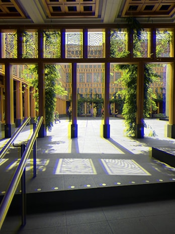Hallway view highlighting the building’s blend of classic architecture and modern remodeling.