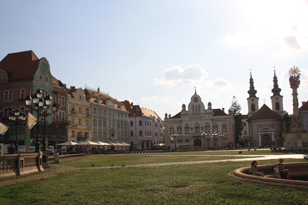 a park with a fountain in the middle of it