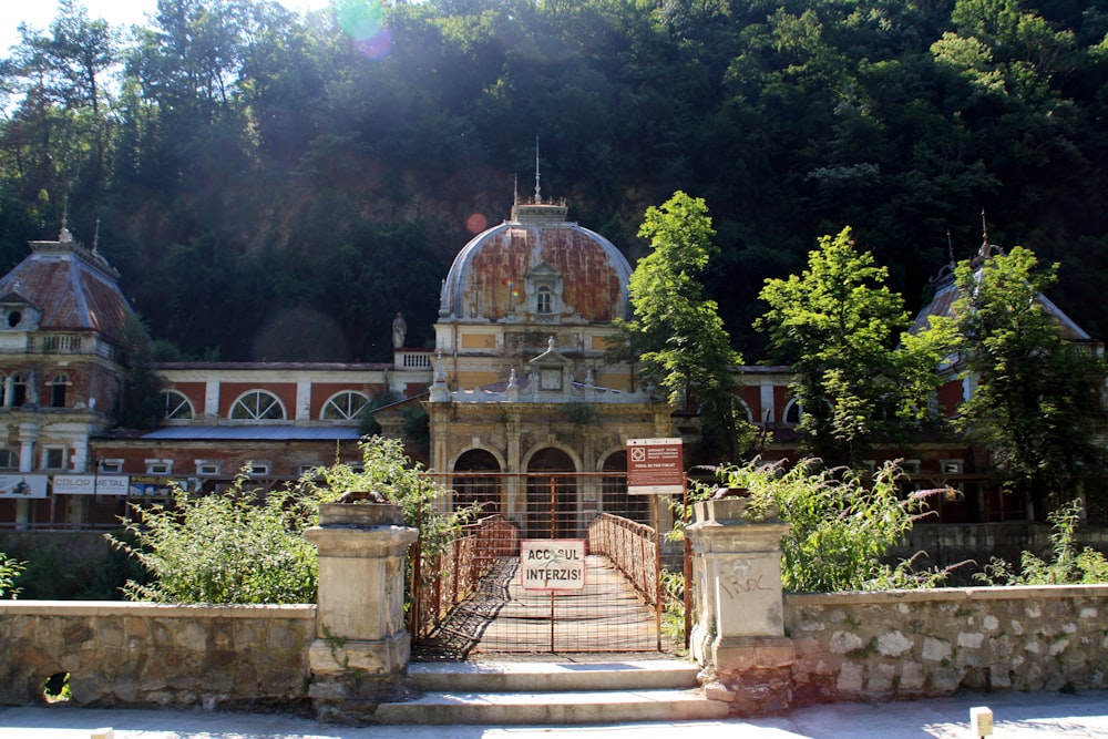 a large building with a gate in front of it