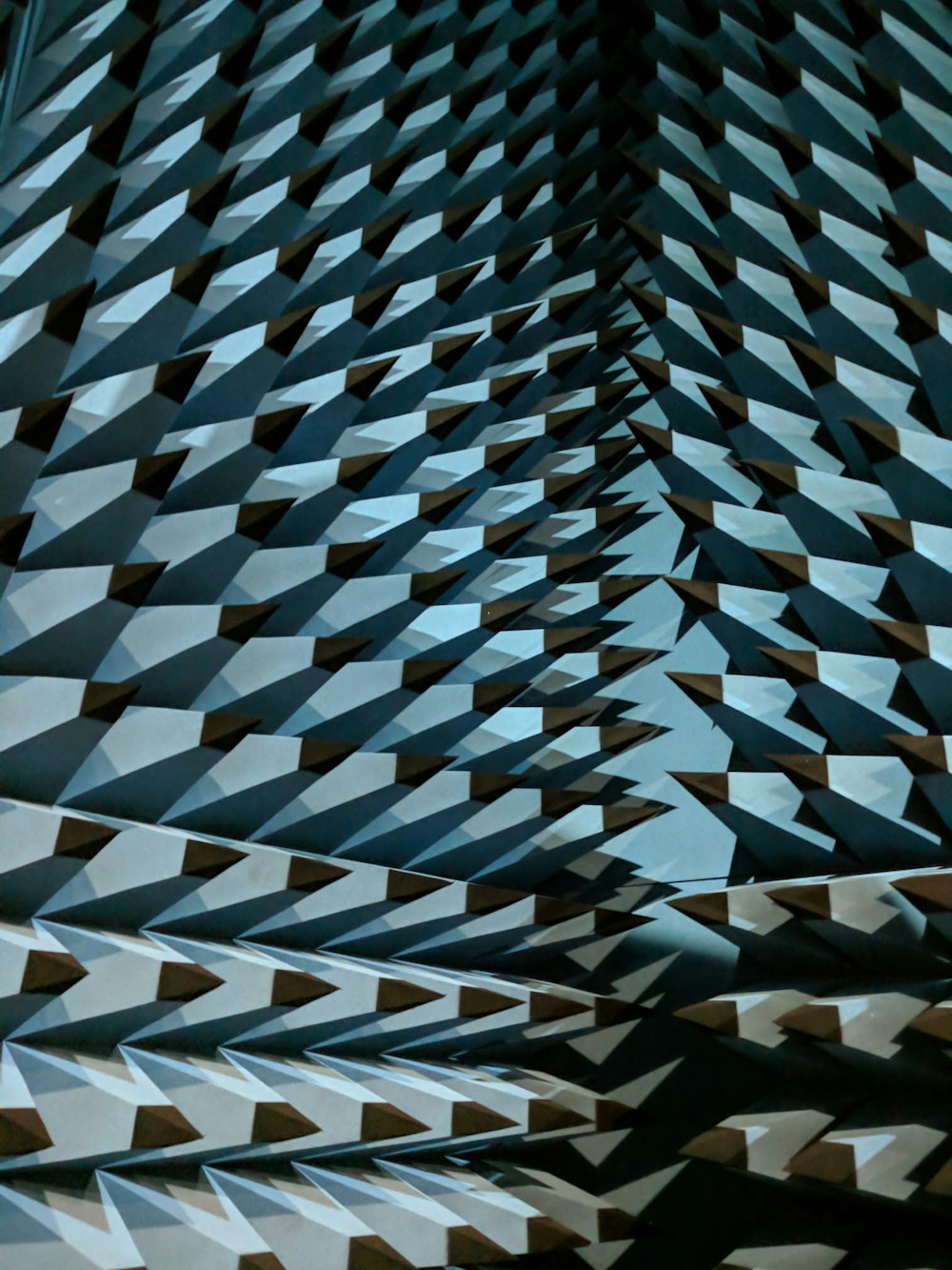 a close up view of a sculpture made of squares