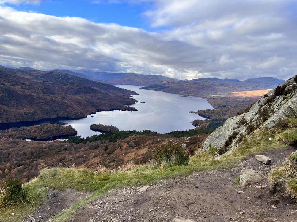 a view of a lake from a mountain top