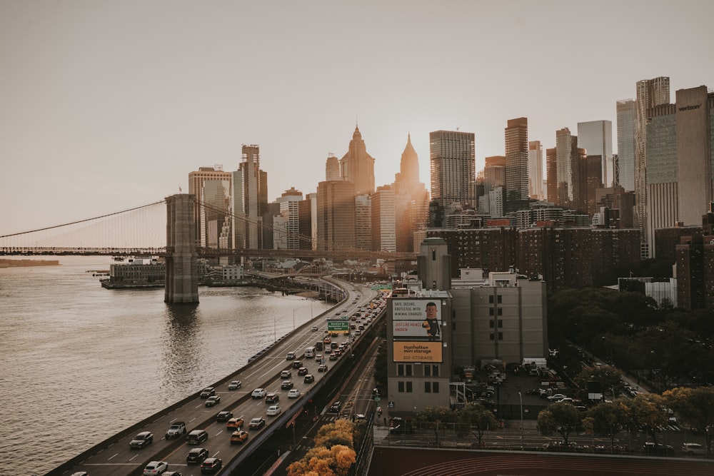 a view of a city with a bridge and a river