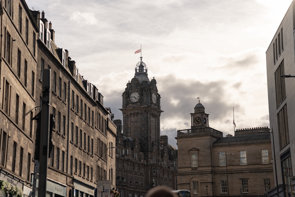 a tall clock tower towering over a city