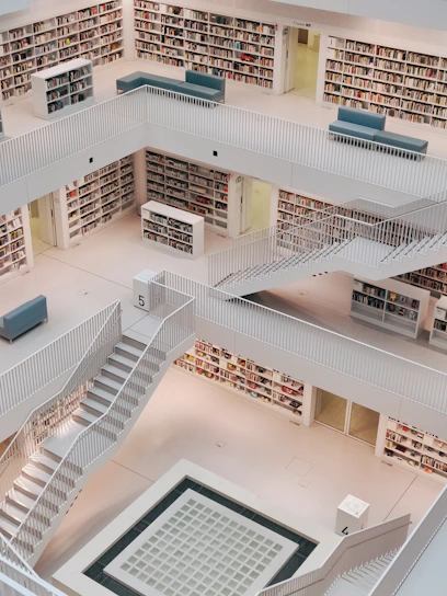 A modern, minimalist law library with dark tones and clean lines.