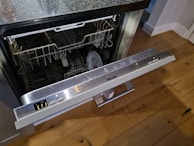 A close-up of a high-quality built-in dishwasher.