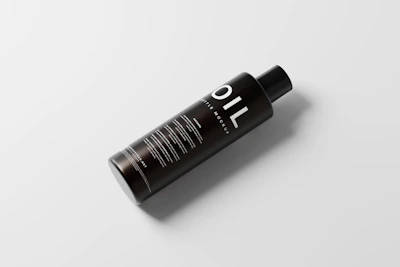 Close-up of a high-quality synthetic oil bottle with clear labeling and a modern, clean backdrop.