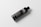 A sleek black bottle with the word 'OIL' prominently displayed in large white letters. The bottle has a simple, modern design with additional text details in smaller white font. It sits on a light, neutral background and casts a soft shadow, giving it a floating effect.
