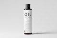 a bottle of oil on a white background