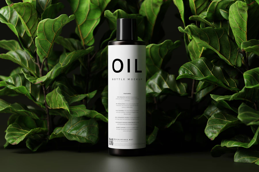 White bottle of body oil in front of lush green fiddle-leaf leaves