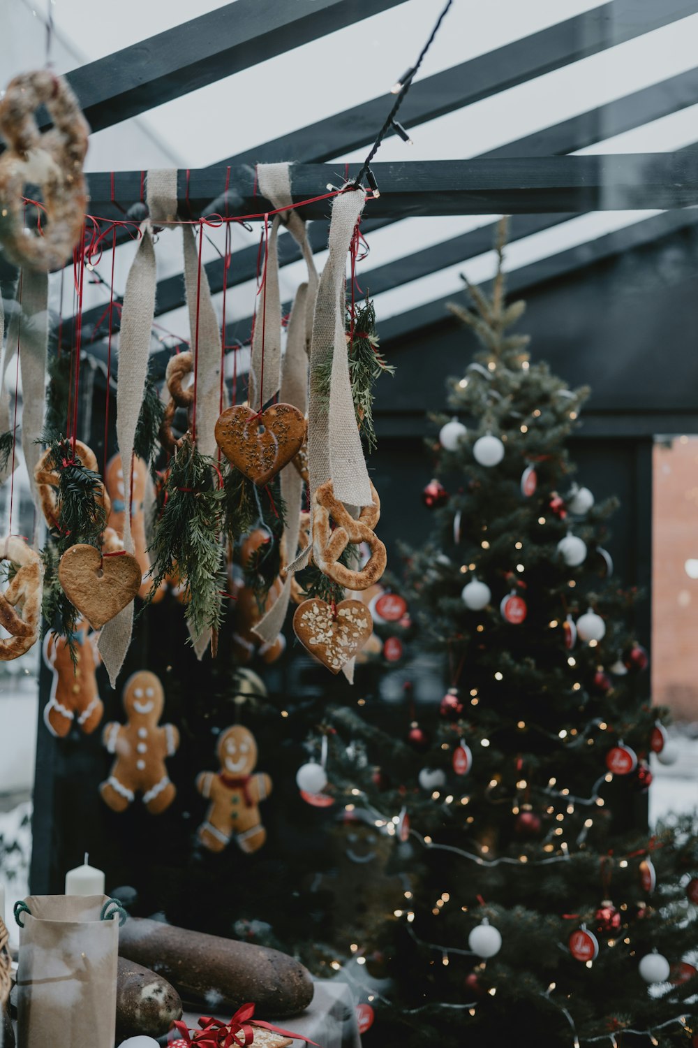 a christmas tree with ornaments hanging from it