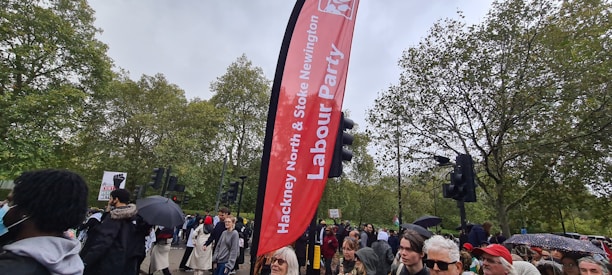 A vibrant GLP rally showcasing diverse supporters united for a better London.
