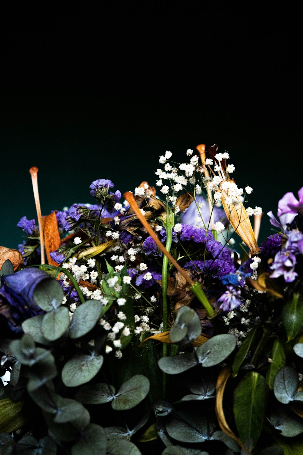 a bunch of flowers that are sitting on a table