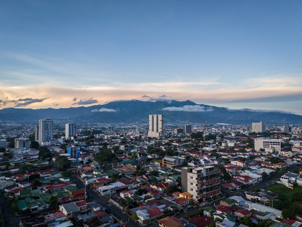 a view of a city with a mountain in the background