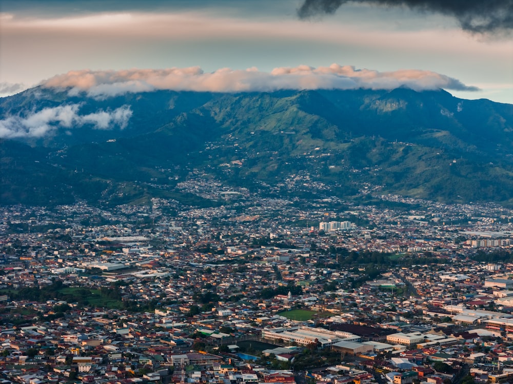 a view of a city with a mountain in the background