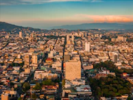 an aerial view of a city with tall buildings