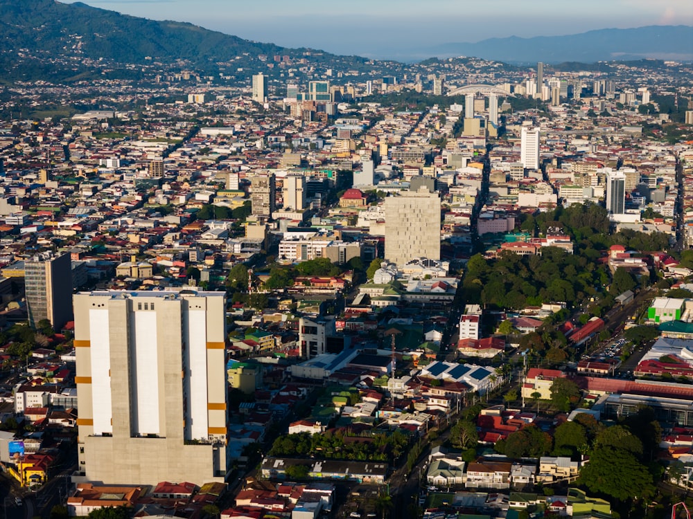 an aerial view of a city with tall buildings