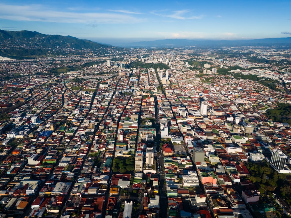 an aerial view of a city with lots of buildings