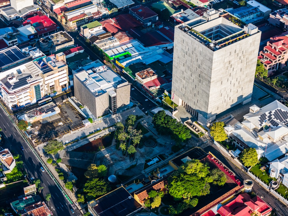 an aerial view of a city with tall buildings