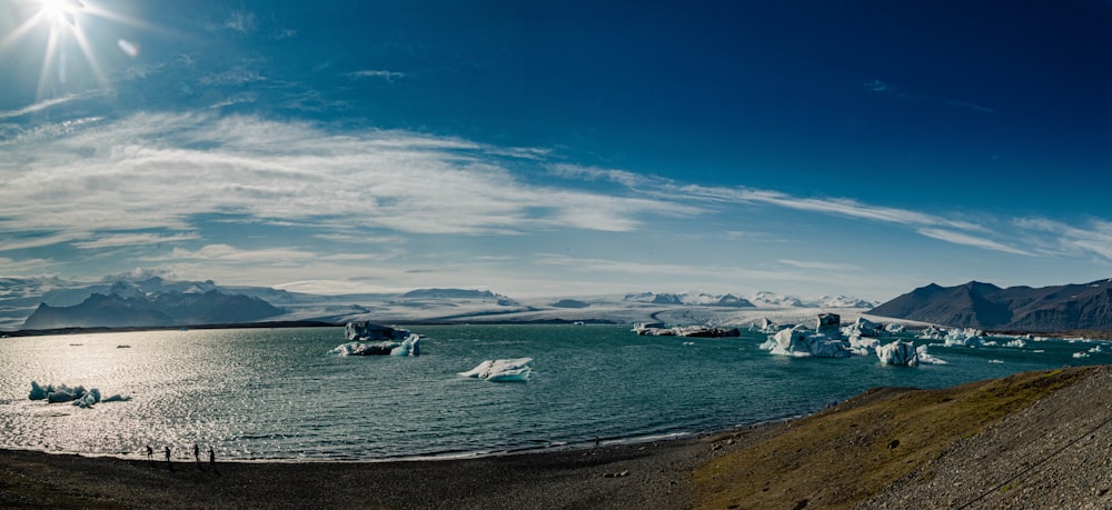 a large body of water surrounded by mountains