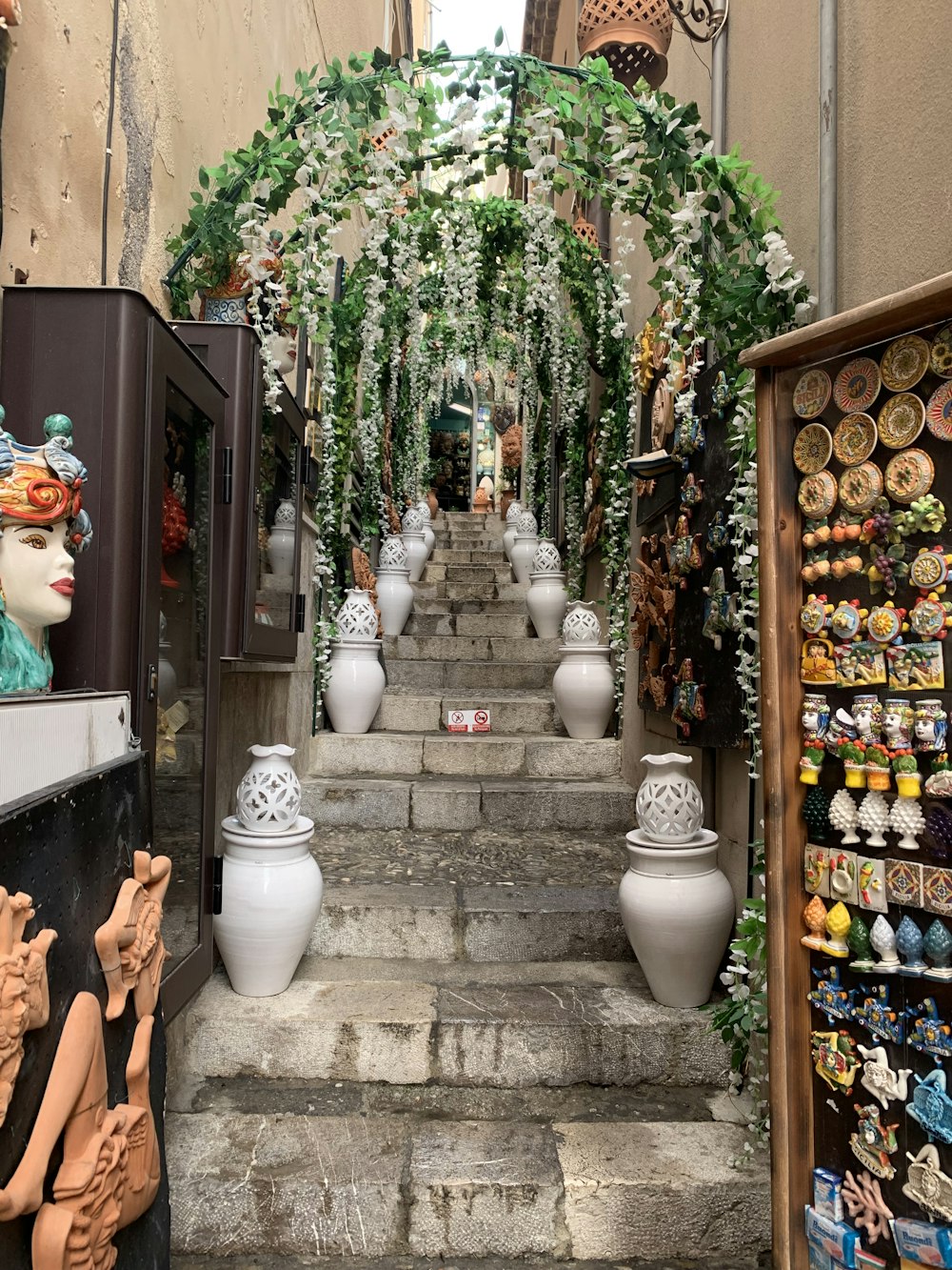 a set of stairs leading up to a store