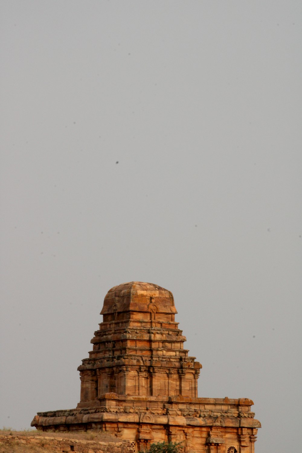 a very tall tower with a clock on top of it