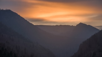 A serene view of the Atlas Mountains at sunset, showcasing natural beauty.
