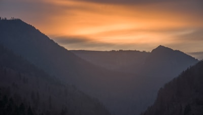 A serene view of the Atlas Mountains at sunset, showcasing natural beauty.