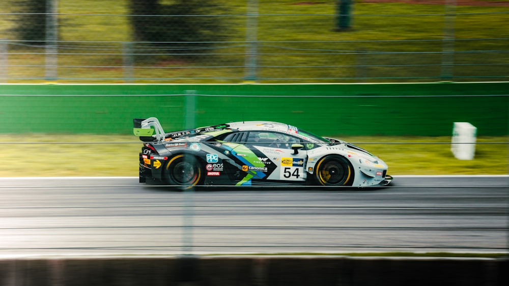 a racing car driving down a race track