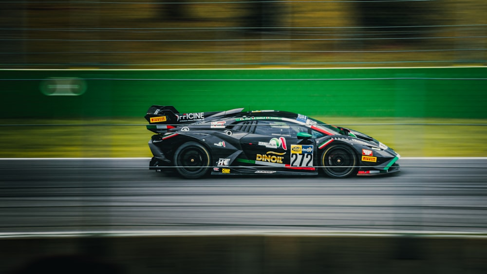 a racing car driving down a race track