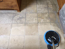 A modern cleaning machine in action, deep cleaning a carpet.