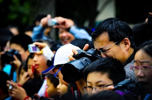 A camera capturing a lively community event with engaged participants.