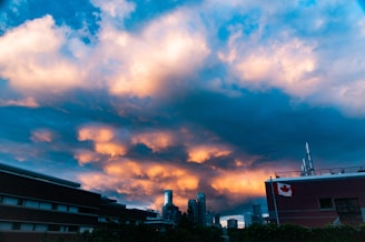 A scenic view of a Canadian city skyline at sunset.