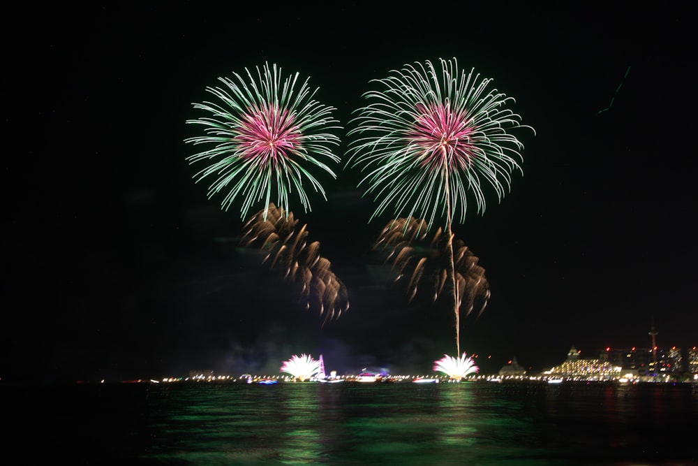 a couple of fireworks that are in the sky