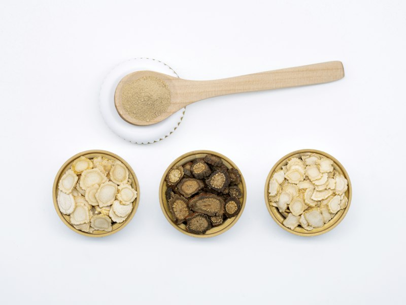 Three bowls of Chinese herbs — carefully measured and prepared.