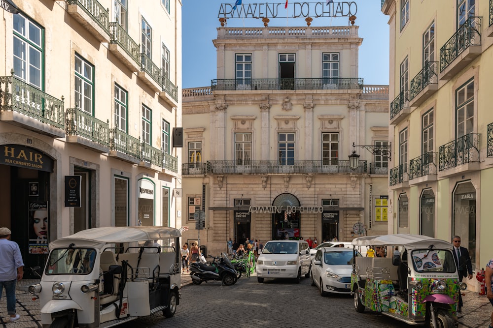 a group of vehicles parked in front of a building