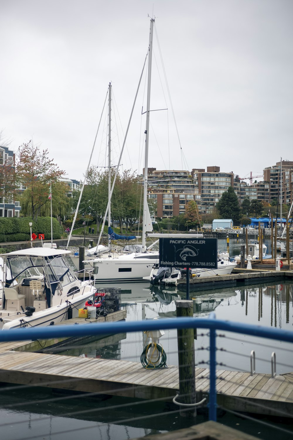 a dock with boats docked at a marina